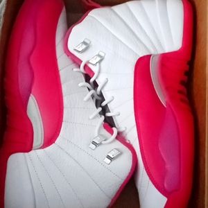 size 9 1/2  pink and white Jordans retros